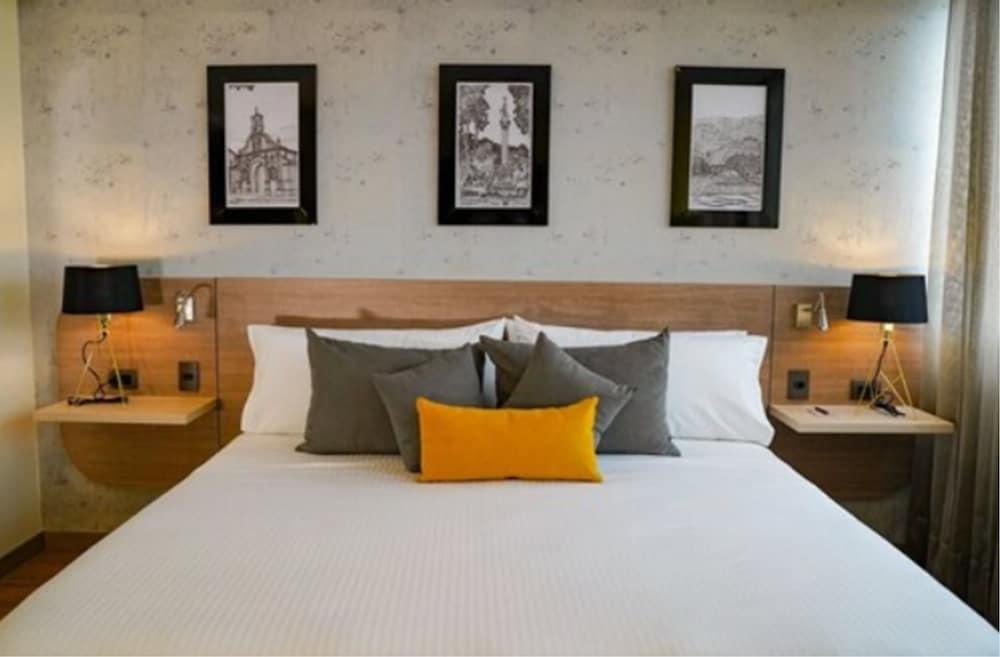 Hotel Casino Internacional 쿠쿠타 외부 사진 A bedroom at the hotel